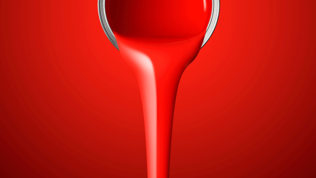 Red paint, pouring to be used to help fix a paint chip