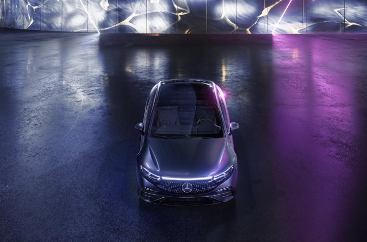 Mercedes eqs vehicle against futuristic backdrop