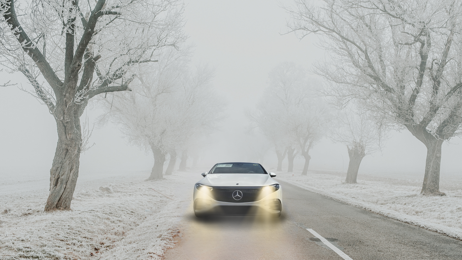 Mercedes EQS 450 sedan on a snowy road